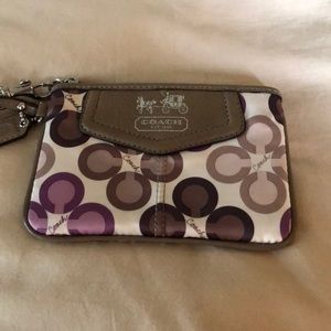 Coach wristlet. Brown, cream, and purple.